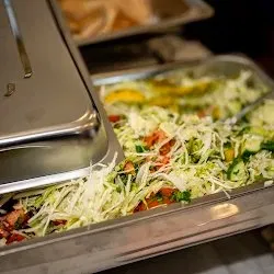 Fresh Greek salad prepared for a large party