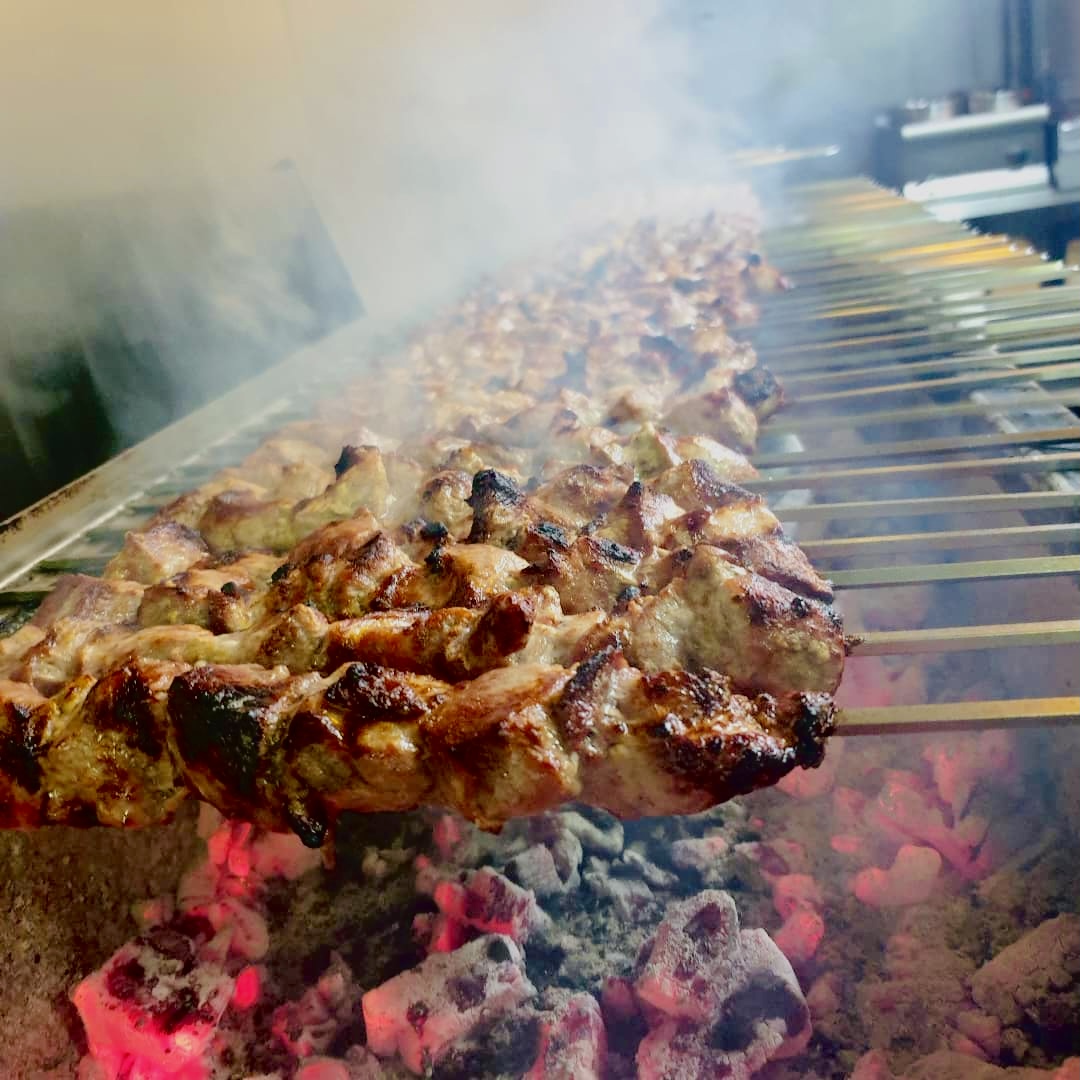 Chicken souvlaki on the charcoal grill