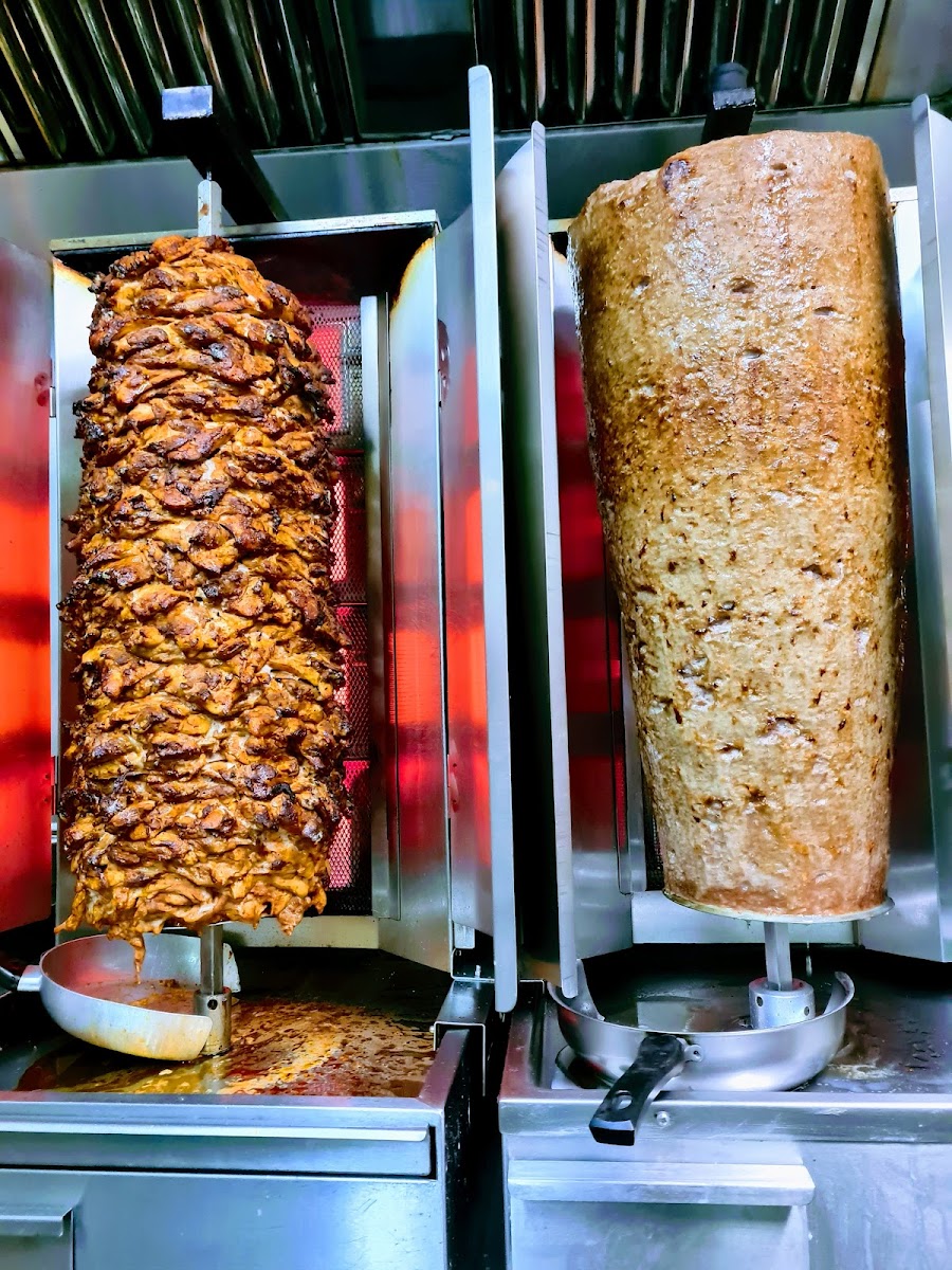 Fresh chicken and lamb doner on the spit